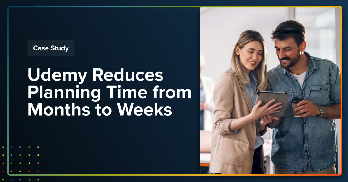 Man and woman looking at screen